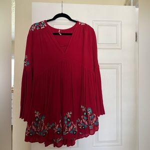 Red Free people top with floral embroidery and belle sleeves